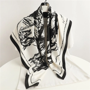 Elegant large black and white silk scarf with abstract linear art print and wide border