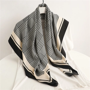 Classic houndstooth silk scarf for women featuring geometric beige and black patchwork design