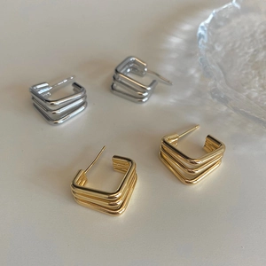Detail of square triple-layer geometric earrings with S925 sterling silver posts