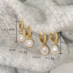 Detailed comparison of 8mm round and 9.8mm teardrop pearl earrings with gold plating