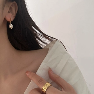 French vintage style pearl earrings and wide textured gold ring set for elegant women