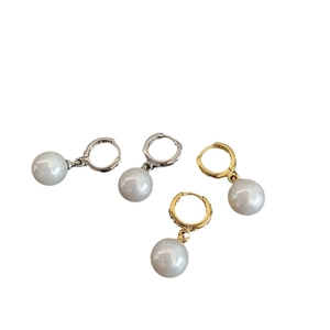 Elegant pearl drop hoop earrings in gold and silver finish with smooth round pearls