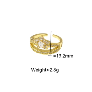 Detail view of gold star ring with 13.2mm width and 2.8g weight zircon settings