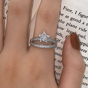 Elegant silver star double-layer ring with sparkling zircon inlays on female model