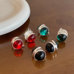 Vintage style round glass ball earrings in red green and black with textured silver metal