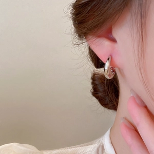 Minimalist silver irregular geometric hoop earrings with polished faceted design for women