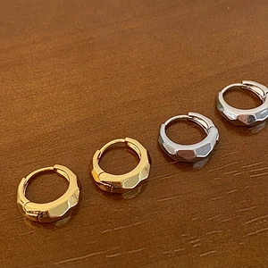 Minimalist geometric faceted hoop earrings in gold and silver plating for daily wear