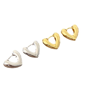 Minimalist chunky heart hoop earrings in polished gold and silver finishes