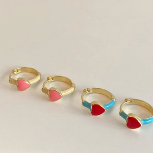 Elegant gold-plated heart drop earrings with red and pink enamel in a minimalist style