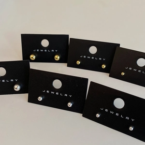 Minimalist round ball stud earrings set in gold and silver finish for daily wear