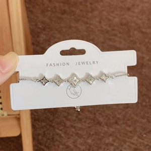 Silver four-leaf flower adjustable bracelet with mother of pearl and micro-inlaid zircon