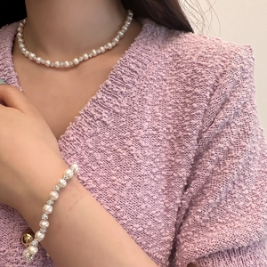 Lustrous freshwater pearl necklace and bracelet set with sparkling crystal accents