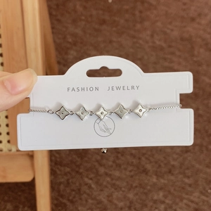 Verstellbares silbernes Kleeblatt Armband mit fünf Perlmutt Anhängern für Damen