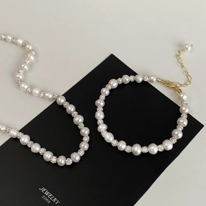Freshwater pearl necklace and bracelet set with rhinestone beads and gold plating