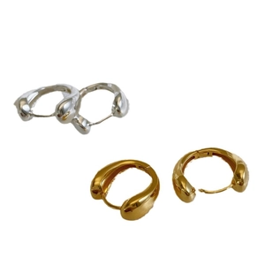 Polished gold and silver teardrop hoop earrings with minimalist irregular design