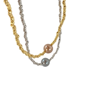 Irregular metal beaded necklaces with sparkling pearls in gold and silver finishes