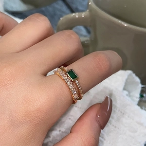Retro emerald cut green gemstone double-layered ring with white cubic zirconia accents