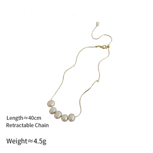 Detail of freshwater pearl pendant necklace with gold chain and size specifications