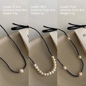 Detailed specs showing three freshwater pearl and black crystal necklaces with lengths