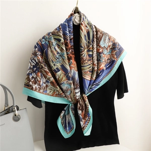 Tropical flora and celestial pattern silk scarf with green polka dot border and lush colors