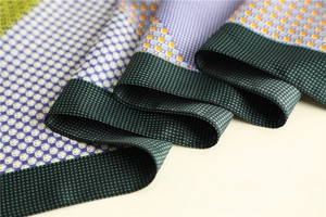 Detailed macro view of the silky geometric pattern fabric with soft satin luster