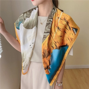 Detail of oil painting style sunflower silk scarf showing vibrant colors and silky texture