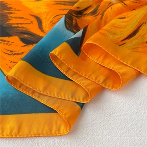 Artistic Van Gogh sunflower print silk-like square scarf with bright orange and blue tones