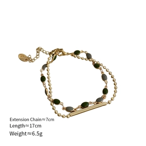 Detail of double-layer bracelet with green beads, 17cm length and extension chain