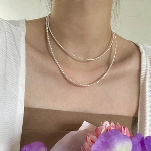 Double-layer thin pearl necklace for women featuring a vintage French design and elegant luster
