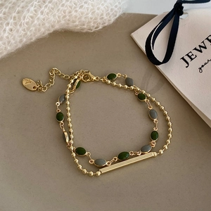 French vintage double-layered bracelet with green oval stones and gold beaded chains