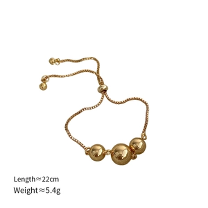 Detailed view of adjustable gold beaded bracelet with dimensions and weight specs