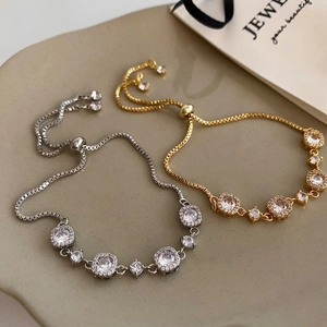 Elegant adjustable bolo bracelets with sparkling cubic zirconia in gold and silver plating