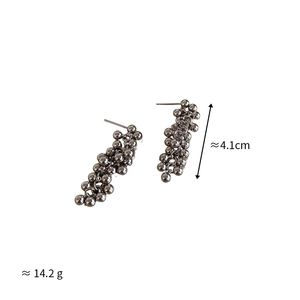Detail shot of gunmetal beaded cluster earrings showing 4.1cm length and 14.2g weight