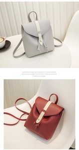 Mini drawstring backpacks in grey and red with contrast stripes and gold buckle detail