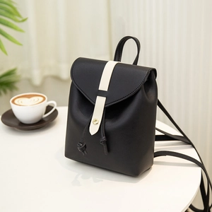 Chic mini black PU leather backpack with contrasting white strap and gold buckle detail