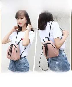 Mini zaino in pelle martellata rosa, indossabile a tracolla o come zaino classico