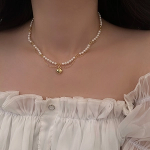 French style double-layer pearl necklace with a polished gold heart-shaped pendant