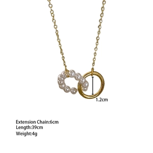 Close-up of interlocking gold-plated ring and pearl pendant with size specifications