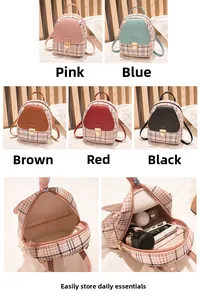 Detailed view of plaid mini backpack interior showing storage for phone and cosmetics