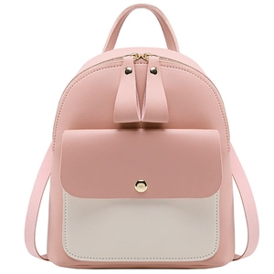 Minimalist pink and beige crossbody backpack with faux leather texture and gold hardware