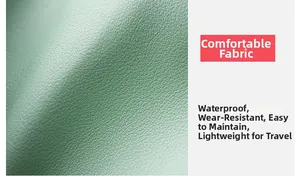 Macro shot of green litchi-texture leather featuring waterproof and wear-resistant fabric