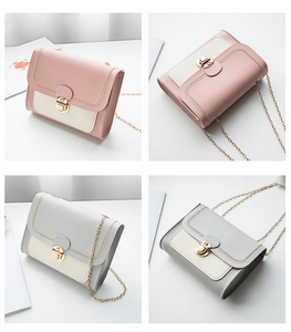 Detail showing wavy stitching and twist-lock on color-block PU leather phone bags