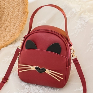 Cute wine red cat-shaped crossbody bag with gold whiskers and adjustable strap