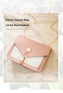 Close-up of pink and white crossbody bag with pearl cat ear clasp and metal tassel