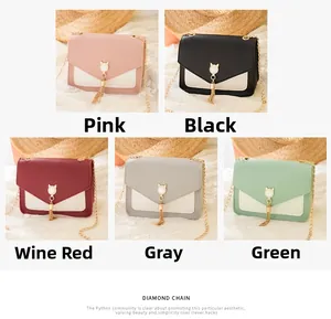 Detailed display of mini crossbody bags with cat ear metal buckles and tassel charms in five colors