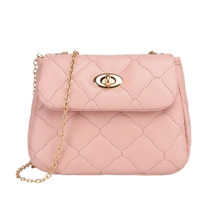 Pink quilted crossbody bag with gold chain strap and oval lock on white background