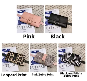 Detail view of stylish fanny packs in leopard and zebra prints with golden ring buckles