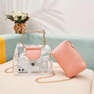 Daisy print clear PVC tote bag with pink inner pouch and gold cat ear metal handles