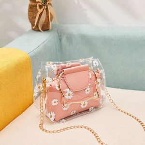 Transparent daisy PVC crossbody bag with pink inner pouch and gold chain strap