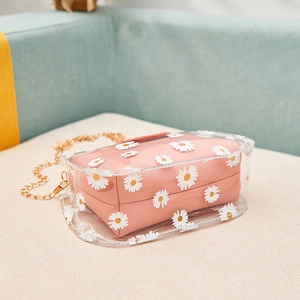 Transparent daisy PVC tote bag with pink inner pouch and gold chain shoulder strap